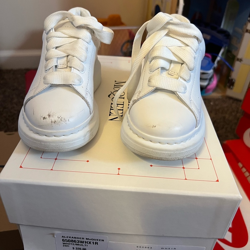 White shoes only worn a couple times. Have a couple of smudges on the front.